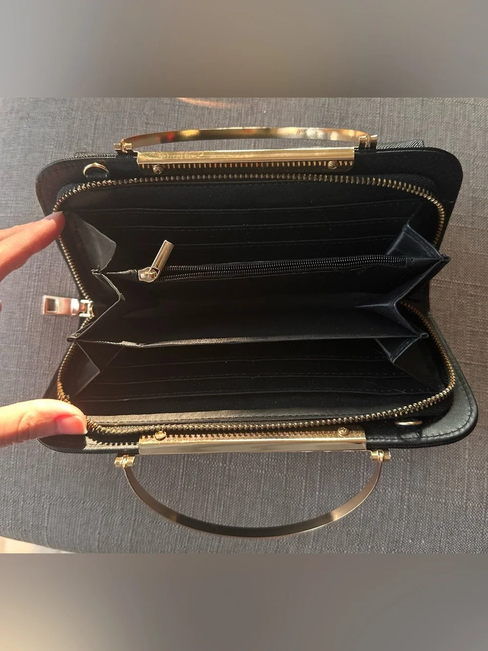 Women’s Black Handheld Clutch with Gold Accent